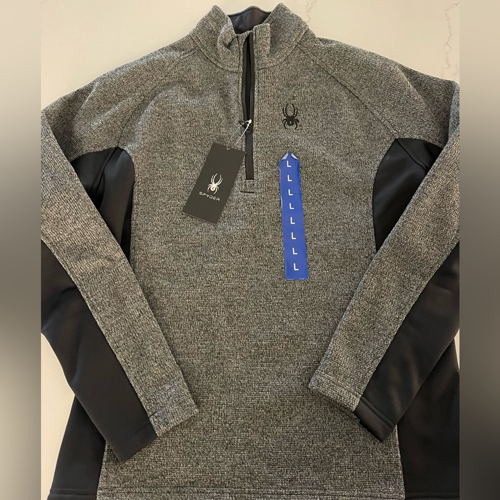 Spyder Brand new  men’s 1/4 zip.